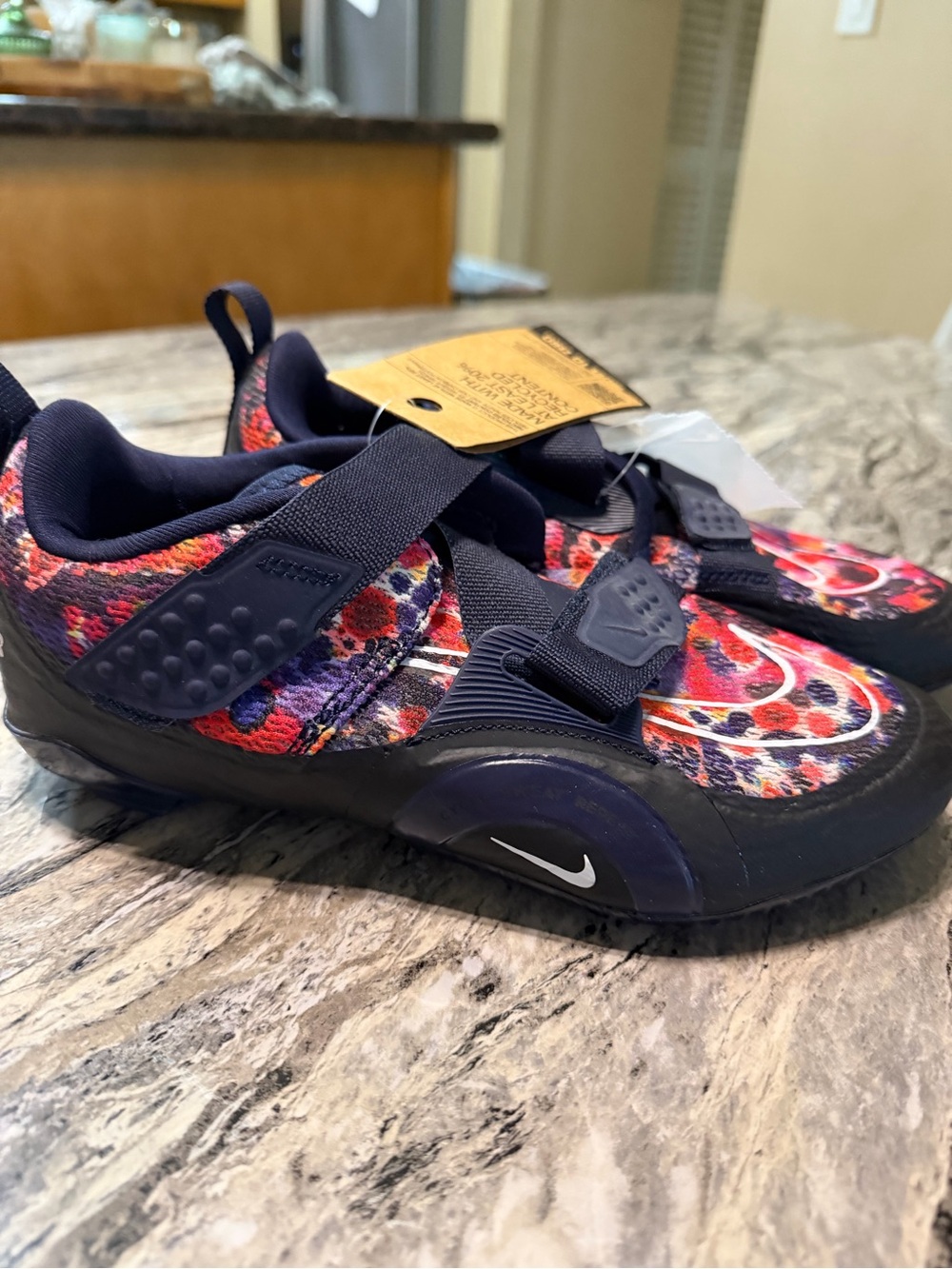 Nike women’s spinning shoes.  Navy Purple and Pink Multicolor Slip-On Sneakers